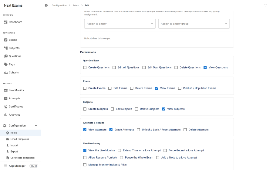The role assignments panel on a saved role, listing assigned users and groups with a user-search autocomplete for adding more